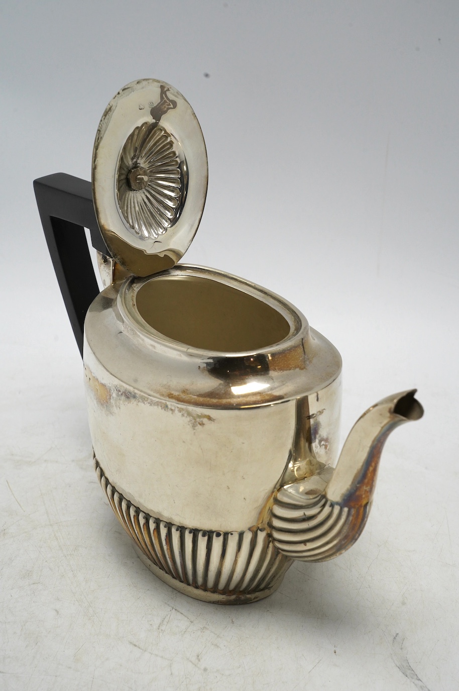 A late Victorian demi-fluted silver oval teapot, by Henry Bourne, Birmingham, 1896, gross weight 11.4oz. Condition - fair